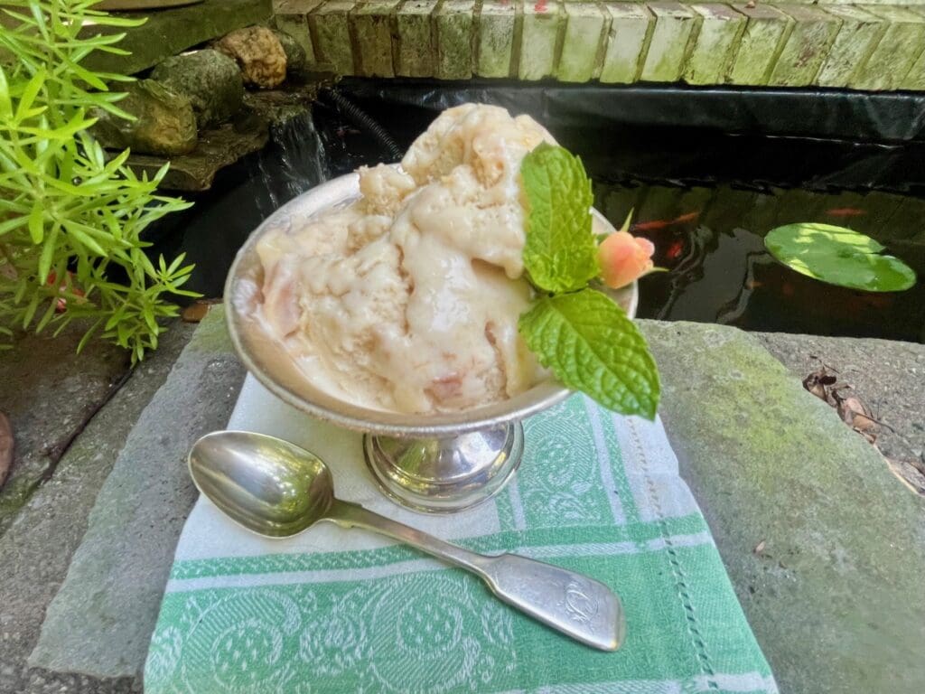 A bowl of ice cream sitting on top of a table.