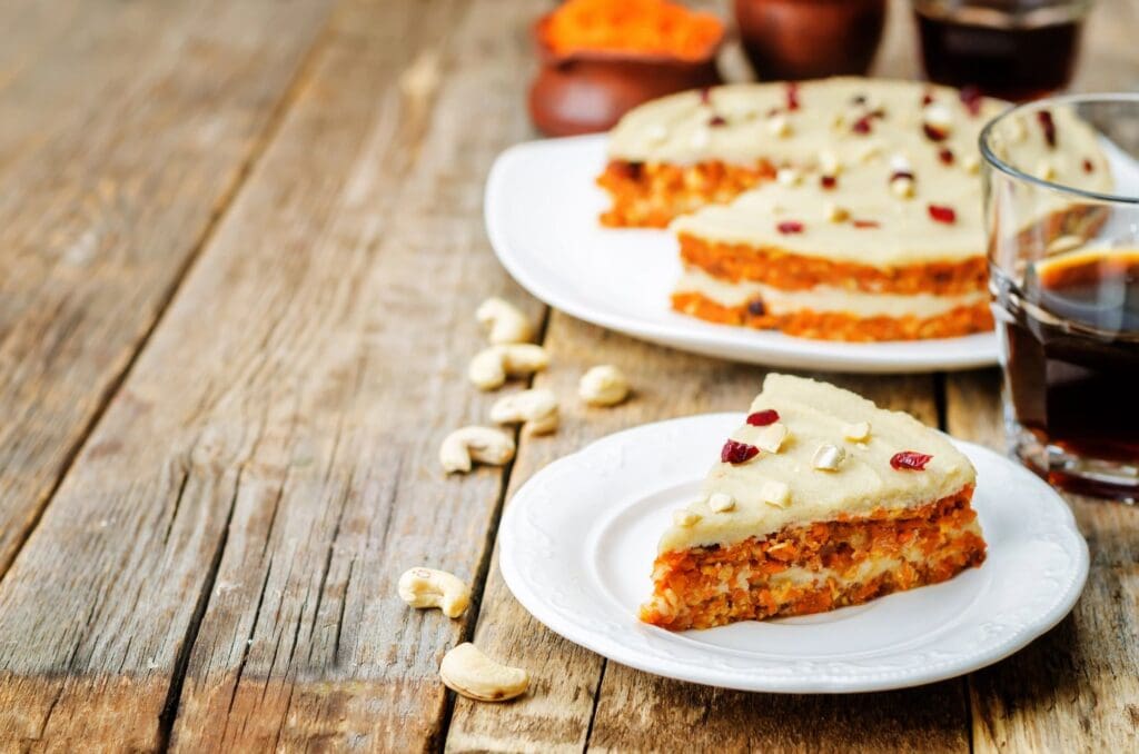 Two plates of food on a table with some crackers