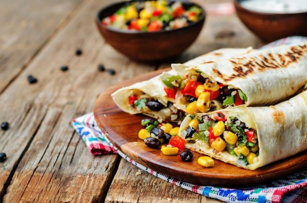 A wooden table with some food on it