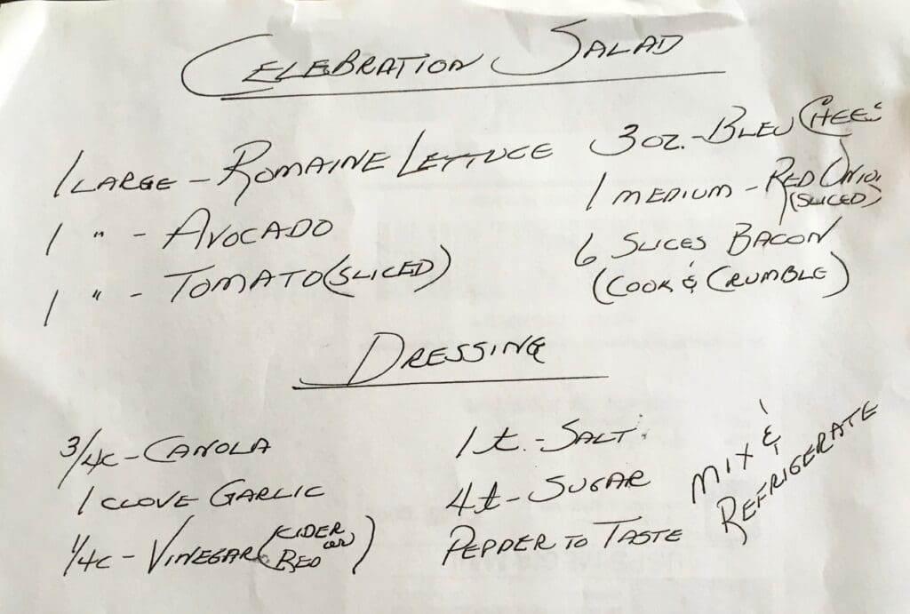 A handwritten menu for an establishment salad.