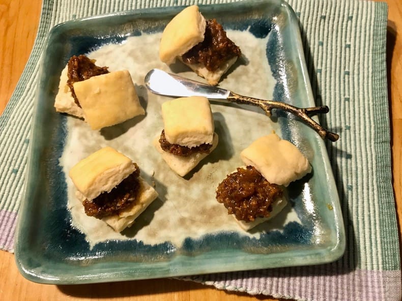 A plate of food with some kind of meat on it