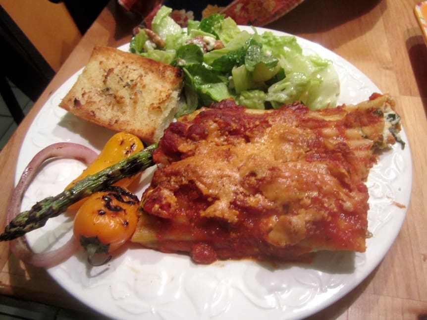 A plate of food with some meat and vegetables on it