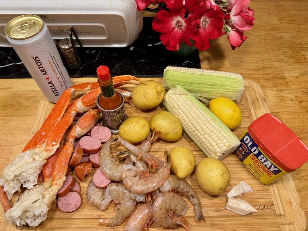 Crab boil ingredients on cutting board.