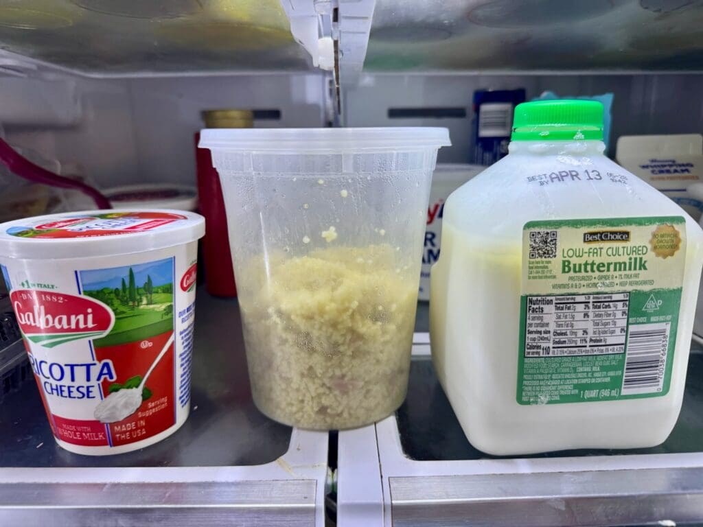 Ricotta, grains, and buttermilk in refrigerator.