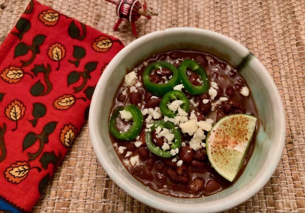 Black bean soup with lime and cheese.