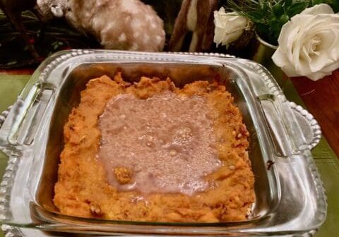 Sweet potato casserole in a silver dish.