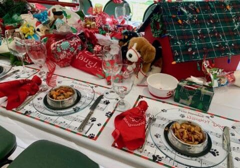 Christmas dog dinner table setting.