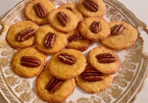 Pecan shortbread cookies on a plate.