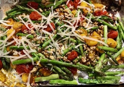 Roasted asparagus, tomatoes, and walnuts.