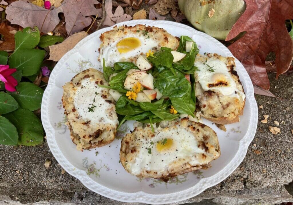 Potato skins with eggs and salad.