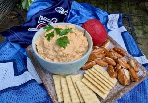 Creamy dip with crackers and pretzels.