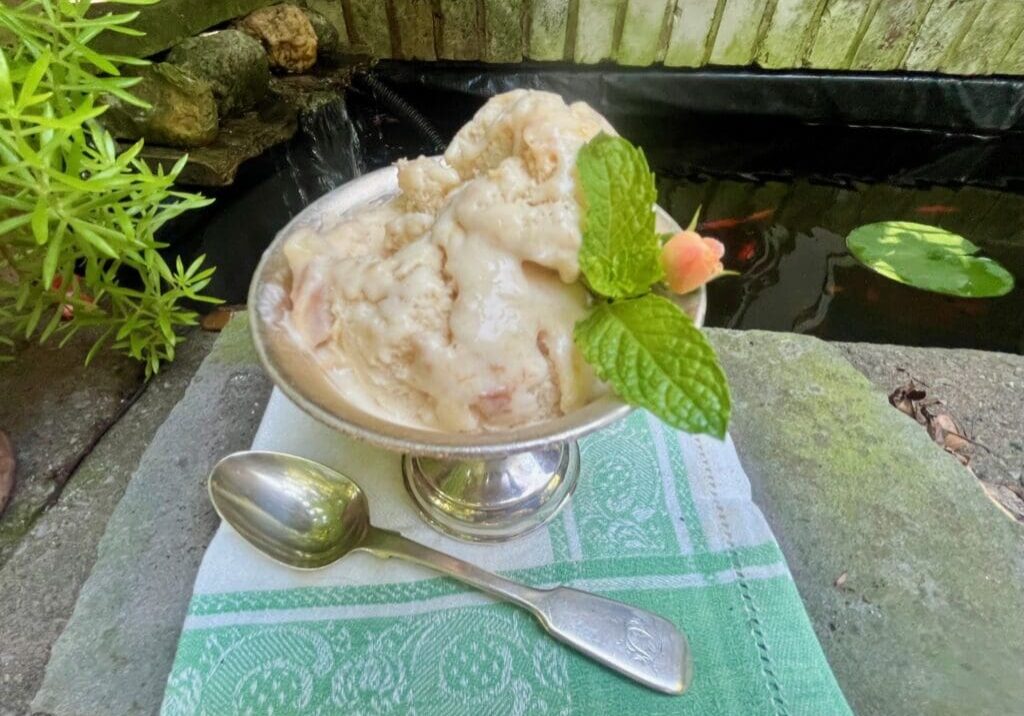 A bowl of ice cream sitting on top of a table.