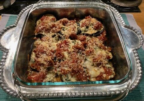 Baked eggplant casserole with cheese and sauce.