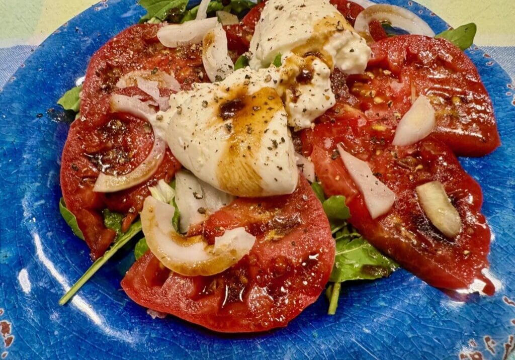 Tomato and burrata salad with balsamic glaze.