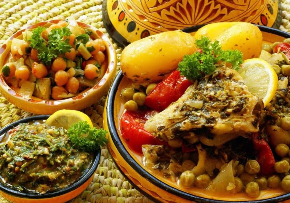 A bowl of food with some meat and vegetables