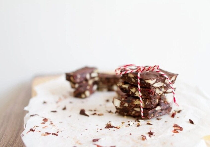 A close up of some chocolate covered cookies