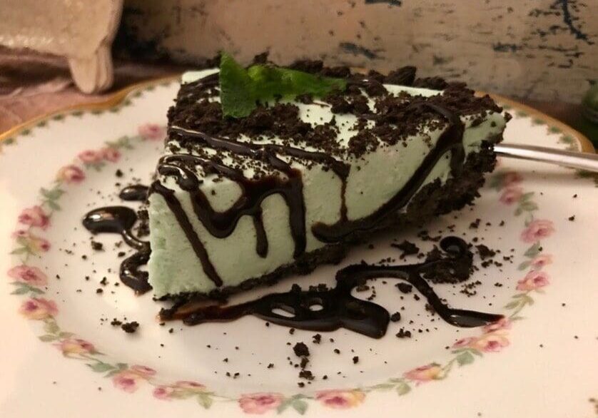 Mint chocolate pie with chocolate drizzle.