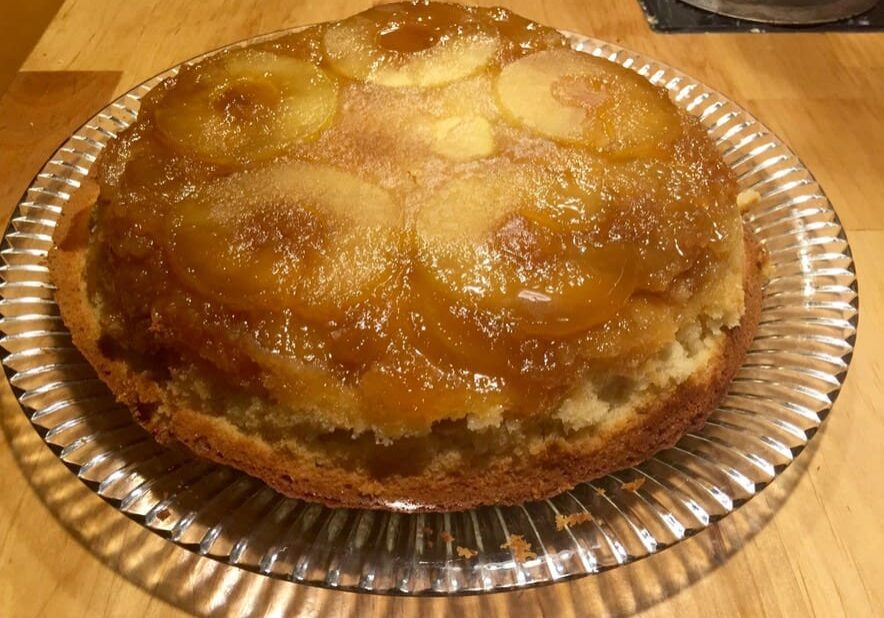 A cake sitting on top of a paper plate.