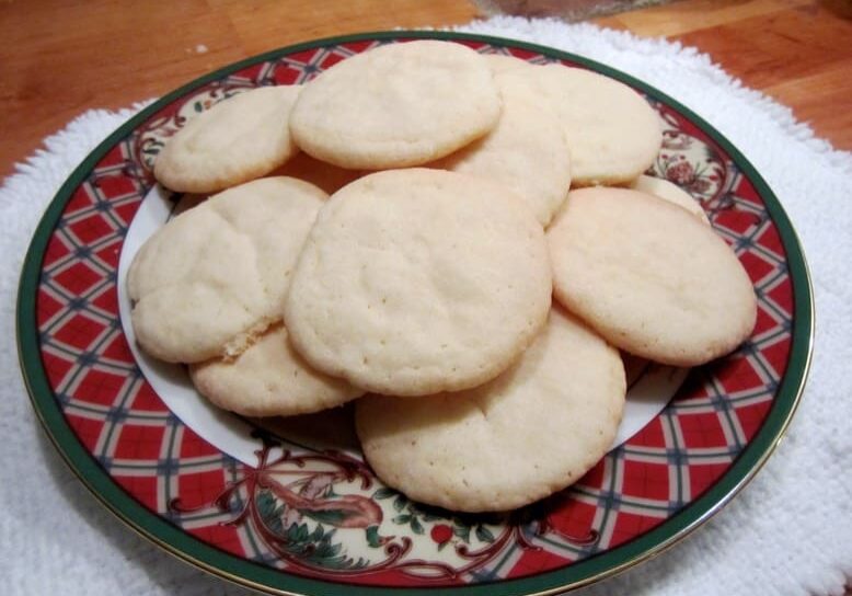 A plate of cookies on top of a table.