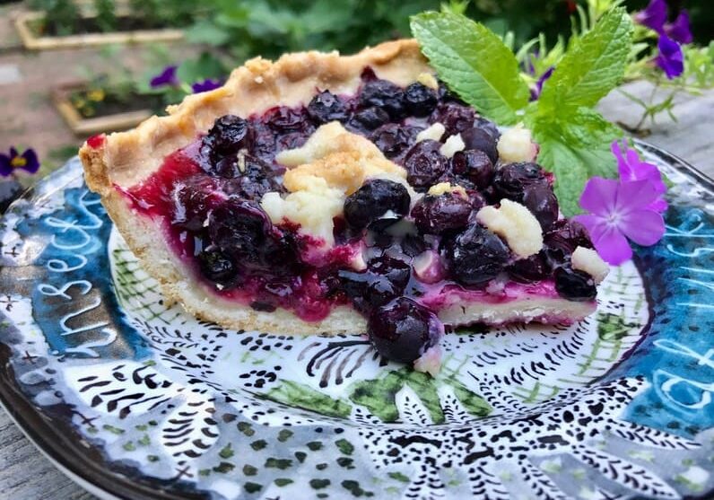 A piece of pie sitting on top of a plate.