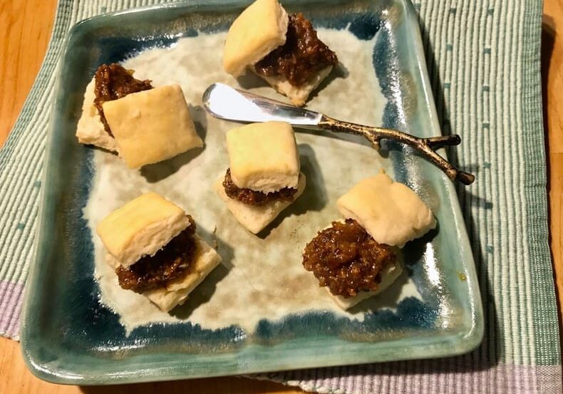 A plate of food with some kind of meat on it