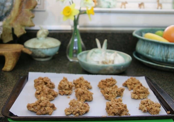 A tray of cookies on top of a counter.